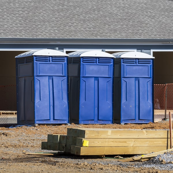 what is the cost difference between standard and deluxe portable restroom rentals in Barrington